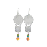 La Dolce Vita 3 Tier Multi-Color Earrings by Firefly feature round and square silver pieces linked with colorful beads and orange teardrop crystals. Handmade in Guatemala, these fair-trade earrings reflect traditional craftsmanship.