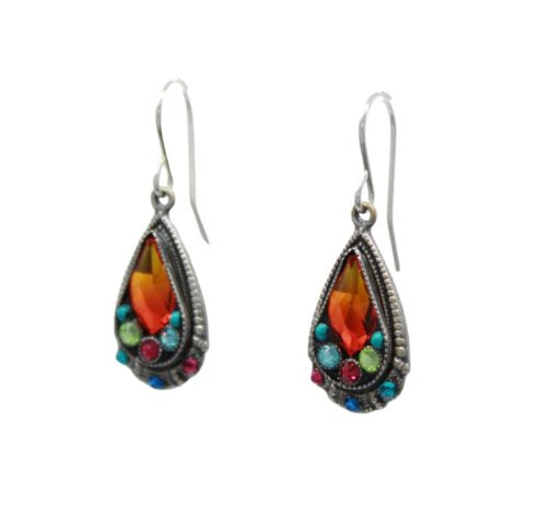 Explore the allure of Fireflys Elegant Drop Multi-Color Earrings, handcrafted in Guatemala. These teardrop-shaped gems boast an orange centerpiece framed by blue, green, and red stones, all set in hypoallergenic silver-toned metal for sensitive skin.
