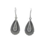 The Elegant Drop Multi-Color Earrings by Firefly feature a silver-colored teardrop shape with a layered design and inner drop motif. Handmade in Guatemala, these hypo-allergenic earrings come with hooks for comfort against a white background.