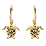 Shanores Gold Vermeil Blue and White Sapphire Turtle Earrings feature detailed designs with dangling charms adorned with lab-grown sapphires, enhancing the intricate allure of ocean jewelry.