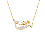 Shanores Gold Vermeil Mermaid Necklace- Ocean Jewelry features a shimmering pendant adorned with sparkling cubic zirconia. The mermaids elegantly flowing hair and the thin, delicate chain complement its intricate design, creating a truly captivating piece.