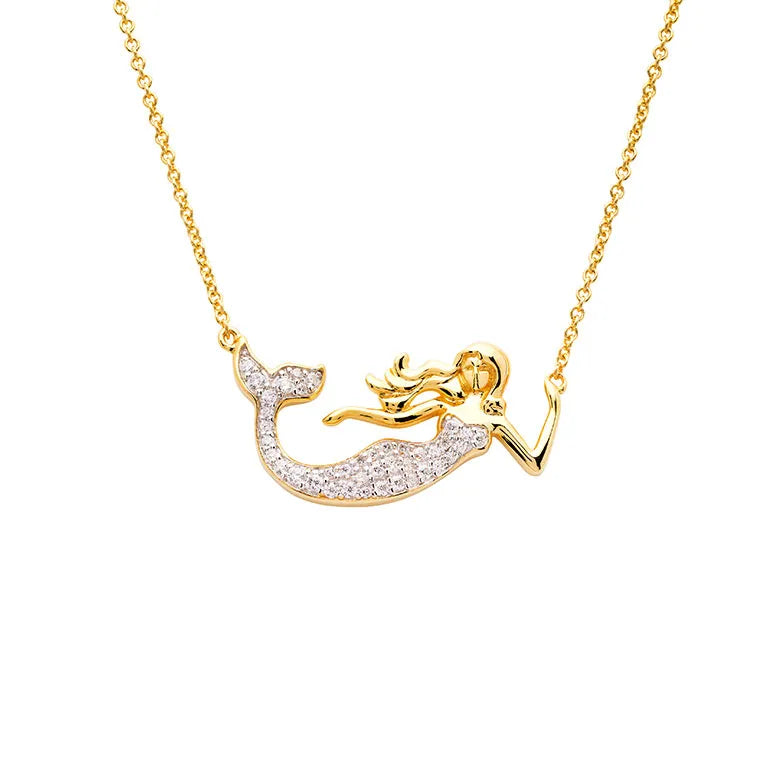 Shanores Gold Vermeil Mermaid Necklace- Ocean Jewelry features a shimmering pendant adorned with sparkling cubic zirconia. The mermaids elegantly flowing hair and the thin, delicate chain complement its intricate design, creating a truly captivating piece.