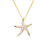 The Shanore Gold Vermeil Starfish Necklace- Ocean Jewelry features a 14k starfish pendant adorned with cubic zirconia stones, set against a plain white background.