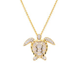 The Gold Vermeil Turtle Necklace from Shanores Ocean Jewelry collection dazzles with Cubic Zirconia on its shell, flippers, and head. This elegant pendant hangs from a delicate gold chain, offering a sparkling accessory suitable for any occasion.