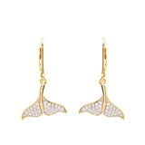 Shanores Gold Vermeil Whale Tail Drop Earrings from the Ocean Jewelry collection, adorned with small sparkling stones, are elegantly displayed on a white background.