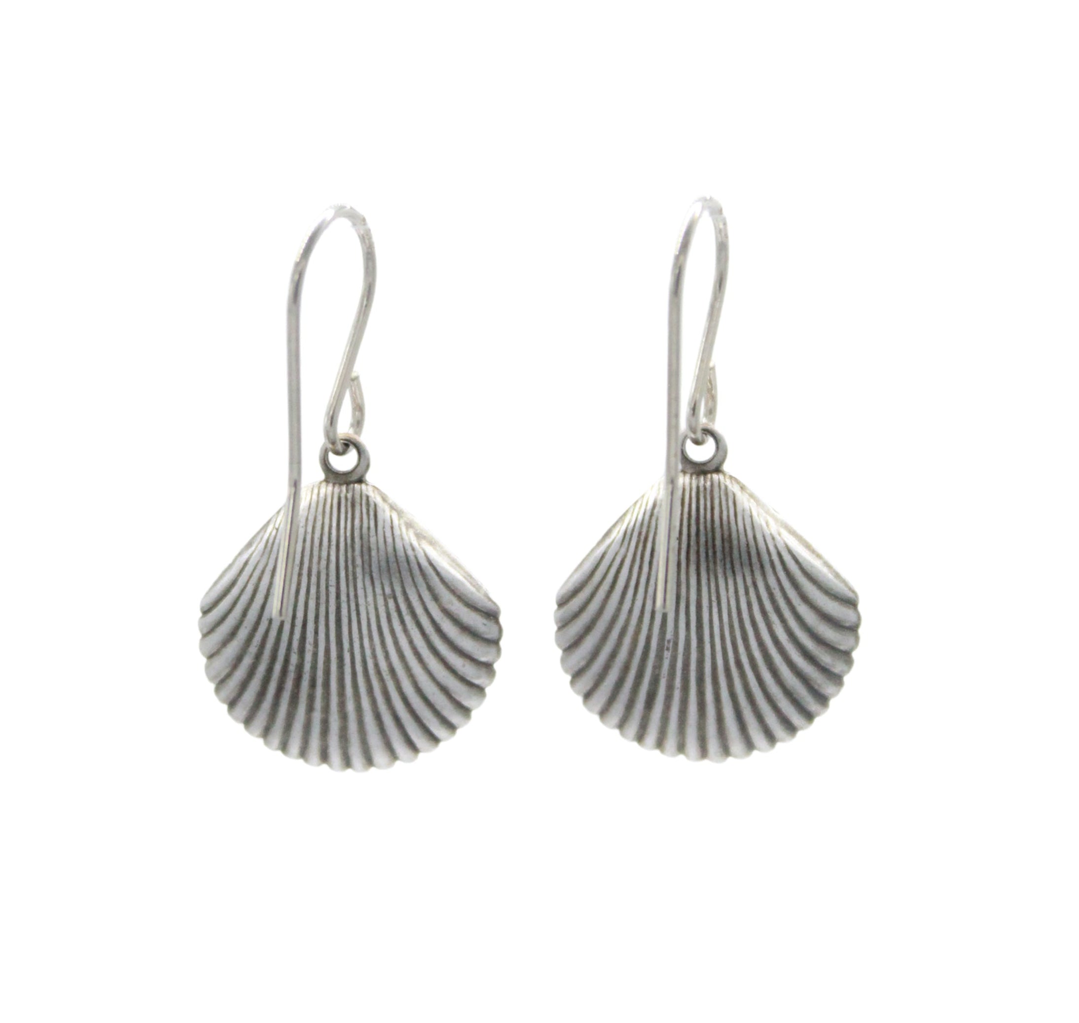 Beach Pearl Large Shell Soft Earrings by Firefly: handmade silver dangle earrings in a scallop shell shape with hooks for pierced ears, beautifully displayed on a plain white background.