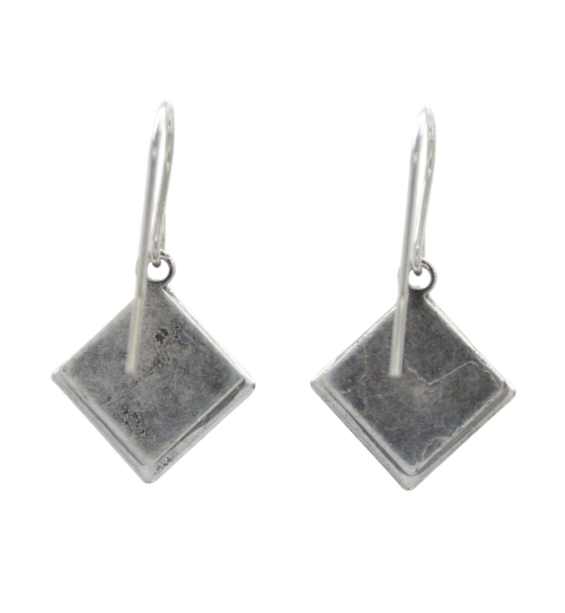 Beach Pearl Diamond Shell Soft Earrings by Firefly feature simple, flat diamond-shaped pendants on hooks. Handmade in Guatemala, these silver dangle earrings are shown on a plain white background.