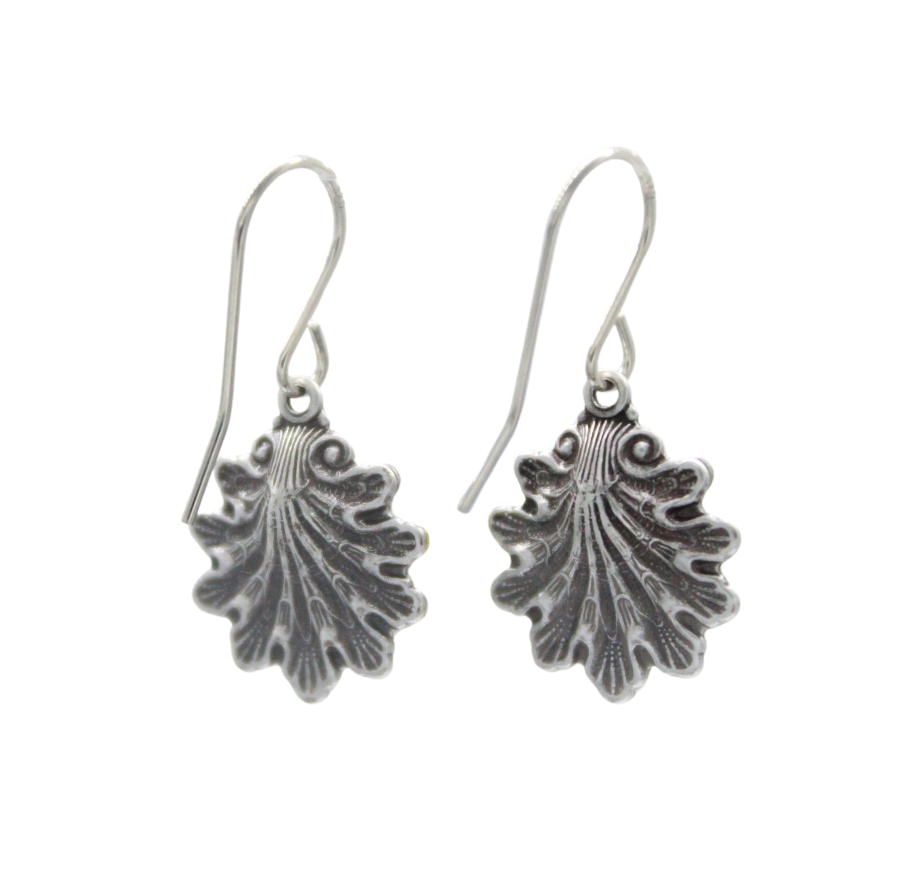 The Beach Glass Aqua Shell Soft Earrings by Firefly are Fair-Trade, hypoallergenic dangle earrings with textured leaf charms and simple hooks—perfect for adding stylish, ethical flair to any look.