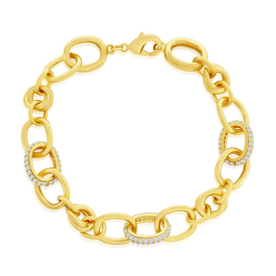 The Classic of New York Gold Plated Micro Pave CZ & Polished Oval Bracelet features sparkling cubic zirconia accents and oval links with a secure lobster clasp closure.