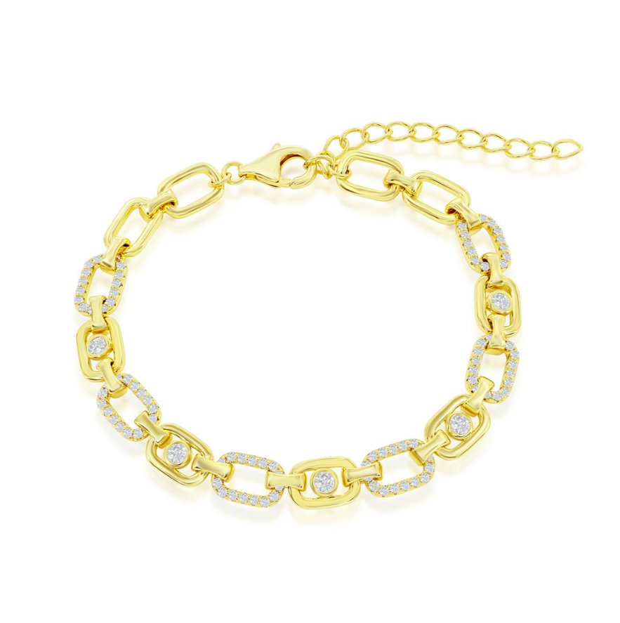The Classic of New York Gold Plated Polished & Open Oval CZ Link Bracelet features oval links accented with sparkling cubic zirconia and is displayed against a white background.
