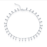 The Classic of New York Sterling Silver Beaded Dangle Charms Anklet features small, evenly spaced dangle charms on a 925 sterling silver chain, shown against a plain white background.