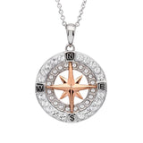 The Shanore Swarovski Crystals Rose Gold Compass Necklace from Ocean Jewelry features a round silver pendant with clear Swarovski crystals, and a rose gold compass star at its center, adorned with cardinal points N, E, S, and W surrounded by shimmering stones.