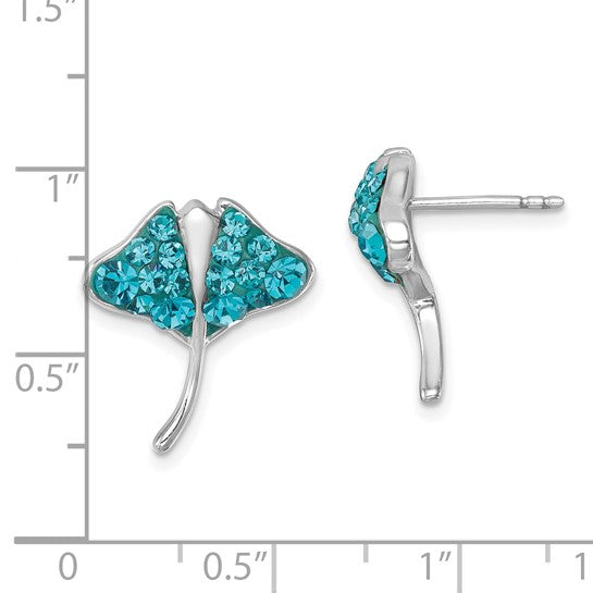 The Crystal Stingray Teal Post Earrings by Presco/Quality Gold are sterling silver, shaped like stingrays and accented with teal crystals. A ruler shows each earring measures about 0.5 inches wide and tall.