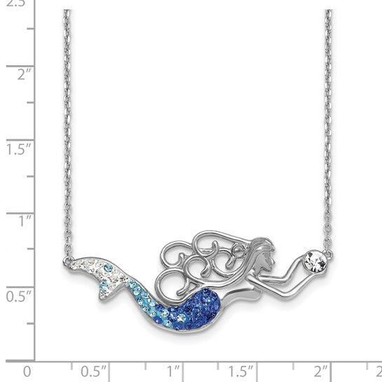The Presco/Quality Gold Crystal Mermaid Necklace features a sterling silver mermaid pendant with a tail set in white and blue stones, holding a clear gemstone, shown against a ruler for scale.