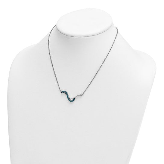 The Presco/Quality Gold Crystal Blue Wave Inlay Necklace features a delicate sterling silver design with a small blue wave pendant, shown on a white mannequin bust.