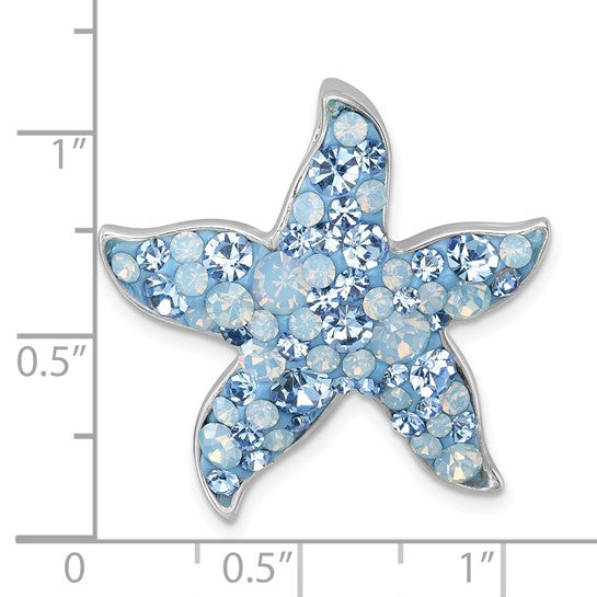 The Presco/Quality Gold Crystal Blue & Clear Starfish Pendant, featuring blue and clear rhinestones, is displayed against a ruler background and measures about 1 inch in width and height.