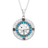 The Shanore Swarovski Crystals Blue Compass Indicolite Necklace features a compass rose pendant adorned with blue and clear gemstones, marked with N, E, S, W for directions and elegantly suspended from a sterling silver chain.