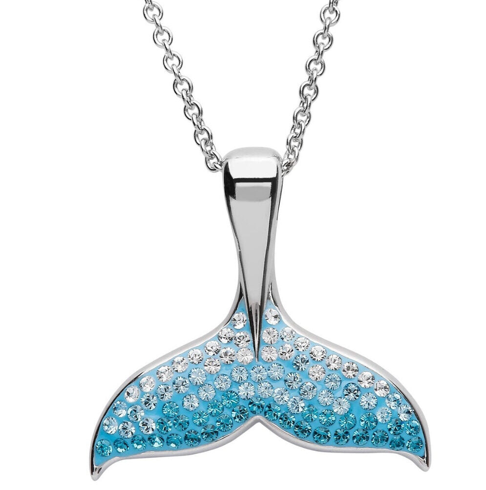 The Shanore Swarovski Crystals Aqua Mermaid Tail Necklace boasts a sterling silver pendant shaped like a mermaid tail, adorned with sparkling blue and white crystals for an ombre effect. The delicate chain enhances the enchanting design of this Ocean Jewelry piece.