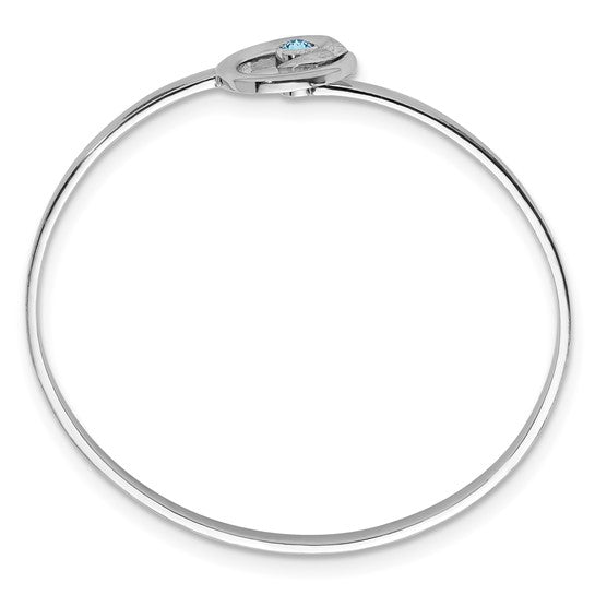 The Presco/Quality Gold Crystal Wave Bangle Bracelet is a thin sterling silver piece with a small oval clasp and a single light blue gemstone, offering a simple yet elegant, timeless jewelry design.