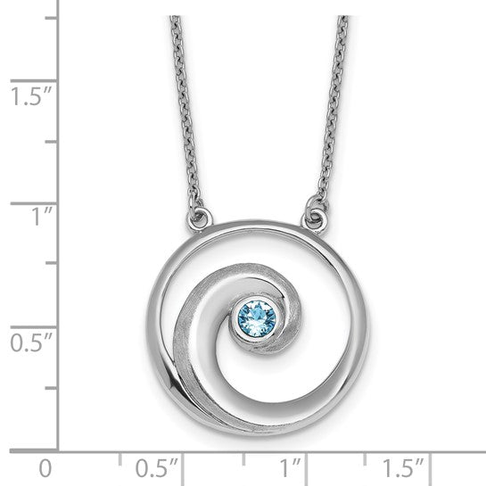 The Presco/Quality Gold Crystal Wave Aqua Crystal Pendant is a sterling silver necklace with a round aqua crystal centerpiece, shown on a white background with a grid indicating the pendant is approximately 1 inch wide.