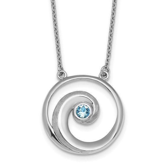The Crystal Wave Aqua Crystal Pendant by Presco/Quality Gold is a sterling silver necklace with a circular swirl design and sparkling aqua crystal centerpiece on a delicate chain.