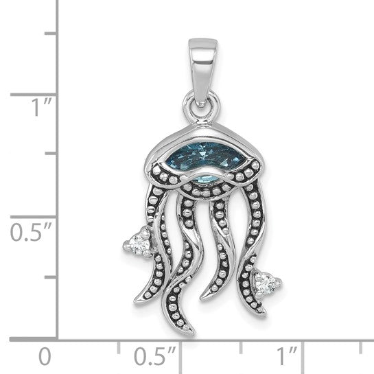 The Crystal Jellyfish Blue & White Pendant by Presco/Quality Gold is shown with inch and half-inch markings for scale, highlighting its elegant design adorned with Swarovski Crystals.
