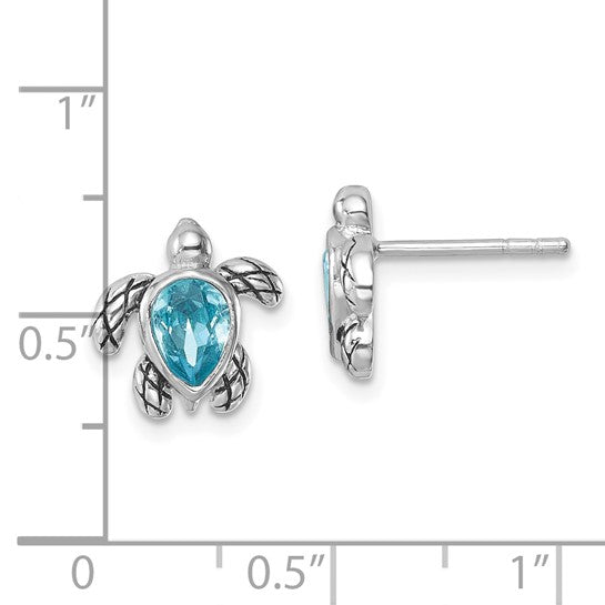Presco/Quality Golds Swarovski Crystals Turtle/Aquamarine Stud Earrings feature turtle shapes with blue crystal shells, each measuring about 0.5 inches long, as shown beside a ruler for scale.