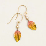 Healing Leaf Peach Earrings by Holly Yashi: These gold hook earrings feature small pearls and pink-yellow leaf-shaped pendants with intricate vein details, crafted from hypoallergenic niobium.