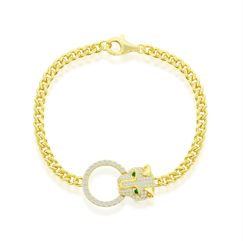 The Classic of New York Gold Plated Panther Emerald CZ Eyes Bracelet features a 925 sterling silver panther head with emerald CZ eyes and clear gems holding a circular ring, shown on a white background.