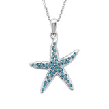 The Shanore Swarovski Crystals Starfish Aqua Necklace features a sterling silver starfish pendant adorned with shimmering blue crystals on a sleek chain, adding a touch of elegance to this ocean-themed jewelry piece.