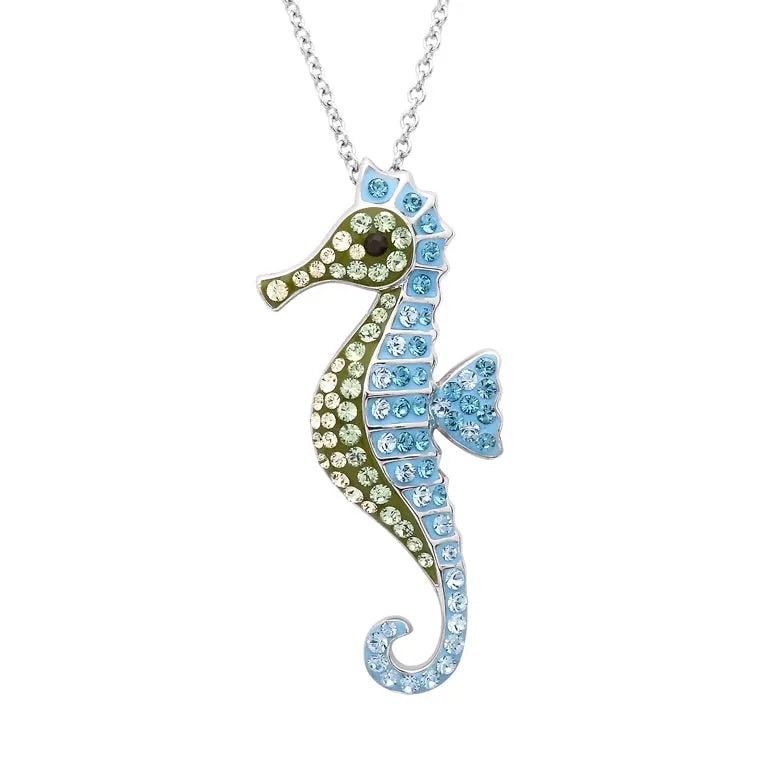 The Shanore Swarovski Crystals Seahorse Necklace features a vibrant pattern of light blue, green, and yellow crystals on a sterling silver chain.