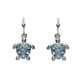 Shanores Swarovski Crystals Aqua Drop Turtle Earrings feature sterling silver turtles with light blue crystals on their shells. These polished earrings have a hook design, and the turtles slightly extended legs and heads add an elegant touch.