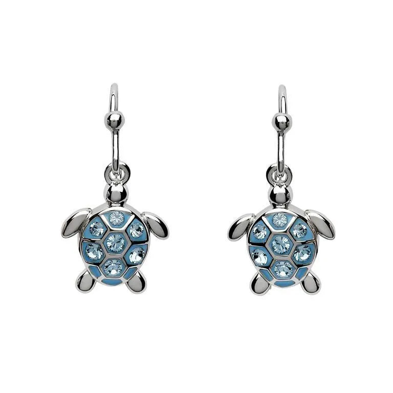 Shanores Swarovski Crystals Aqua Drop Turtle Earrings feature sterling silver turtles with light blue crystals on their shells. These polished earrings have a hook design, and the turtles slightly extended legs and heads add an elegant touch.