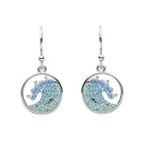 The Swarovski Crystals Blue Wave Earrings by Shanore feature a circular wave design with blue and green crystals, creating a shimmering oceanic effect. They gracefully hang from sterling silver hooks.