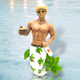 The Colada Ornament by December Diamonds features a shirtless merman in a straw hat and sunglasses with a palm tree patterned mermaid tail. He holds a coconut drink and sunscreen against a blurred blue water-like background, making it an eye-catching decoration for any space.