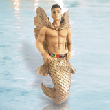 The Gaybriel Ornament by December Diamonds features a muscular, golden mermaid with wings against a blue water background. With its detailed scaled tail and colorful belt, its perfect holiday decor that adds a whimsical touch to any mermaid ornament collection.
