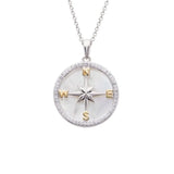 The Shanore Swarovski Crystals Mother of Pearl Compass Necklace features a stunning sterling silver design with a round pendant, central star shape, and gold-toned N, E, S, W letters on pearlescent background, adorned with Swarovski crystals and hanging on a delicate chain.
