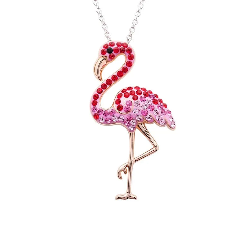 The Shanore Swarovski Crystals Pink Flamingo Necklace-Ocean Jewelry features a pink and red crystal flamingo with a raised leg, elegantly hanging from a sterling silver chain.