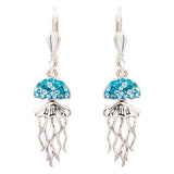 The Shanore Swarovski Crystals Aqua Jellyfish Earrings boast sterling silver tentacles, turquoise gemstone-encrusted tops, and a shimmering metallic finish. Secure lever-back closures make these exquisite earrings an ocean jewelry masterpiece.