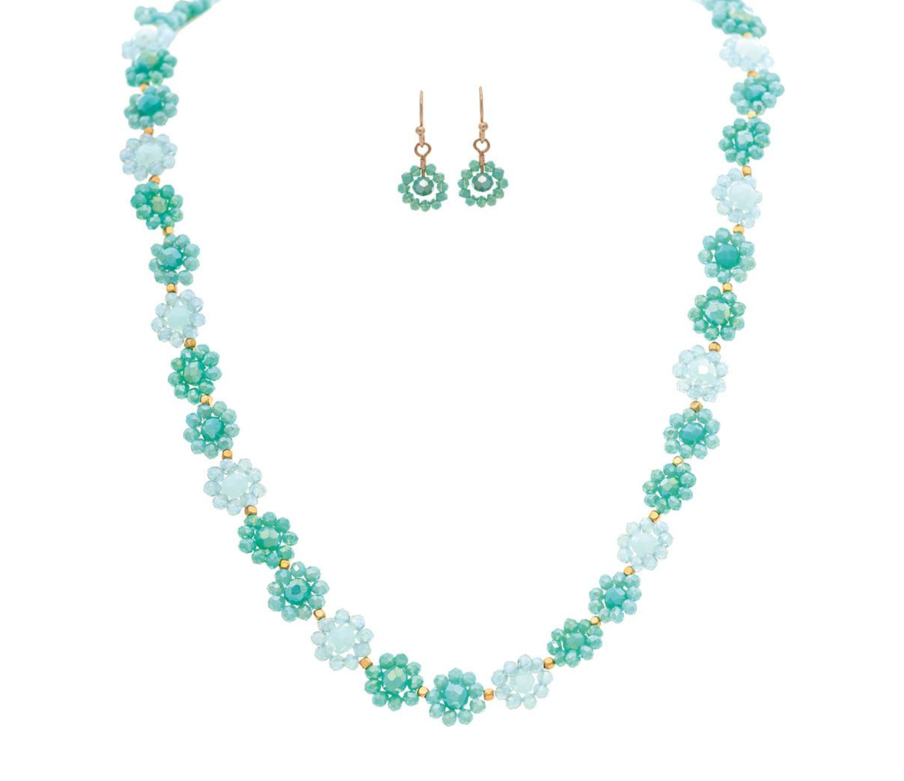 The A-Train Gold Blue Multi Flower Bead Links Necklace Set features clustered blue and green flower-shaped beads with gold accents. This versatile set includes matching earrings—ideal for any jewelry collection.