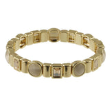 Origin Warm Gold/Cream Circles stretch bracelet featuring alternating gold-tone rectangular links, round cream-colored cabochons, and small rectangular faceted stones.
