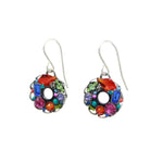 The Bejeweled Multi-Color Hoop Earrings by Firefly feature vibrant gemstones—blue rectangular, red teardrop, and round pink, green, and purple stones. Handmade in Guatemala with a metallic hook for easy wear, these fair-trade pieces exemplify Fireflys craftsmanship.