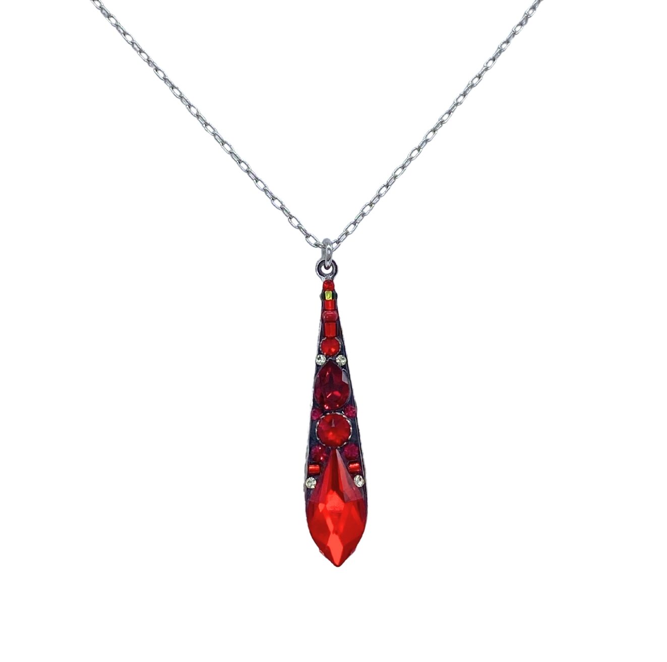 Discover the Large Gazelle Red Drop Necklace by Firefly Jewelry: a handmade Guatemalan silver chain showcasing a vibrant teardrop-shaped red pendant adorned with tiny gems. This elegant piece reflects the artistry and charm of fair-trade jewelry.