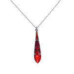 Discover the Large Gazelle Red Drop Necklace by Firefly Jewelry: a handmade Guatemalan silver chain showcasing a vibrant teardrop-shaped red pendant adorned with tiny gems. This elegant piece reflects the artistry and charm of fair-trade jewelry.