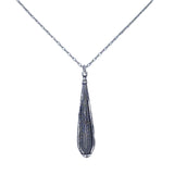This fair-trade Firefly jewelry piece, the Large Gazelle Red Drop Necklace, features a silver necklace with a feather-shaped pendant. Meticulously handmade in Guatemala, its intricate engravings add texture while the delicate chain enhances its elegance.