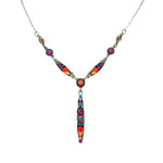 Handmade in Guatemala by Firefly Jewelry, the Linear “Y” Multi-Color Necklace features vibrant red, purple, green, and orange gemstones set in silver on a delicate chain. It showcases fair-trade practices and an ornate design.