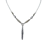 The Linear Y Multi-Color Necklace by Firefly Jewelry, handmade in Guatemala, showcases intricate leaf-shaped links with a central dangling feather pendant.