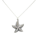 The Starfish Multi-Color Necklace by Firefly features a detailed starfish pendant on a delicate chain, handmade in Guatemala.
