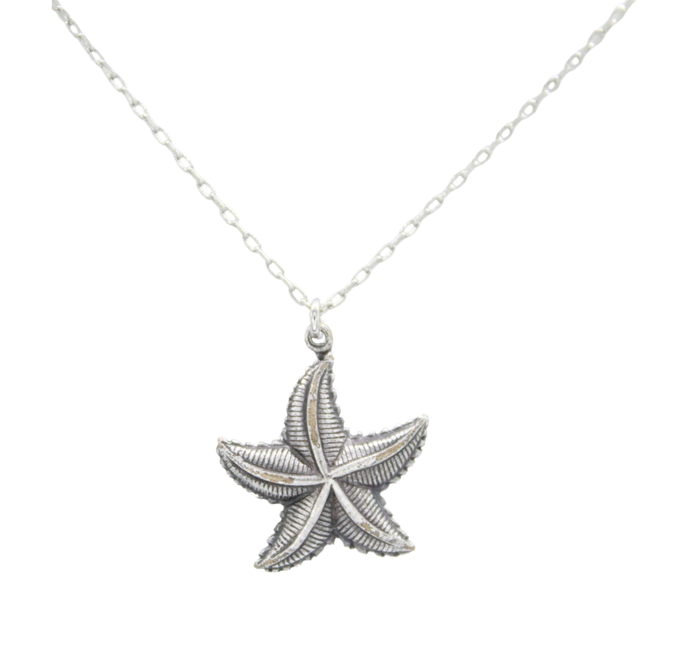 The Starfish Multi-Color Necklace by Firefly features a detailed starfish pendant on a delicate chain, handmade in Guatemala.