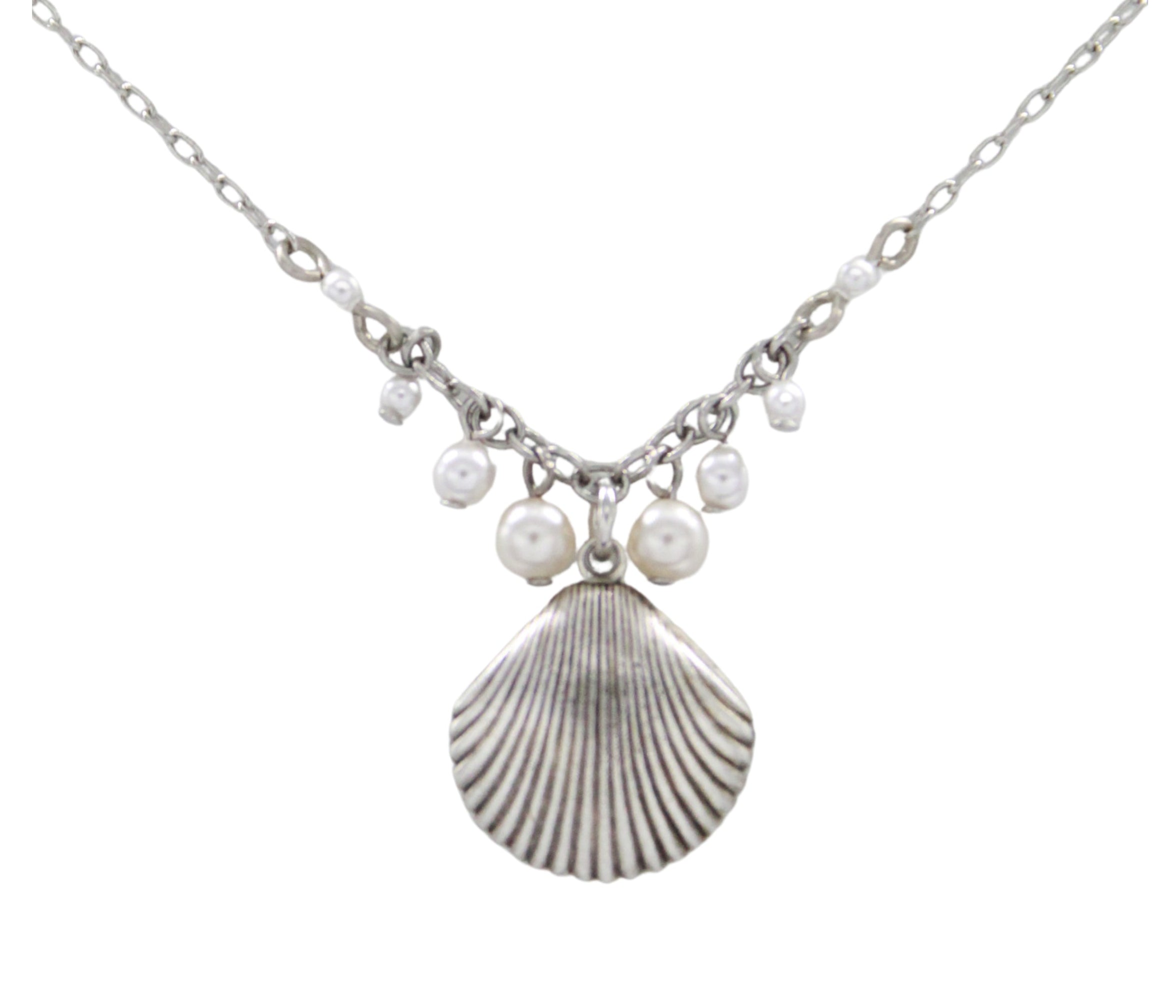 The Firefly Beach Pearl Large Shell Fringe Soft Necklace features a central shell pendant with white pearls and beads, displayed on a plain white background. Handmade in Guatemala for the Firefly Jewelry collection.